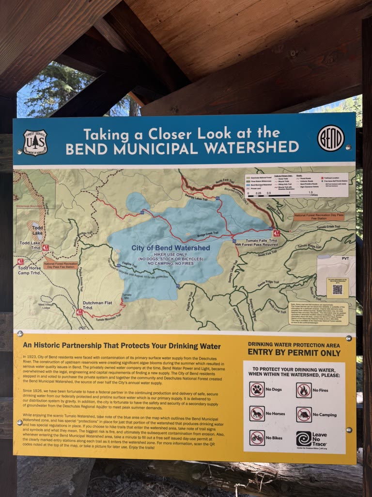 Bend Municipal Watershed sign with a trail map and protection rules