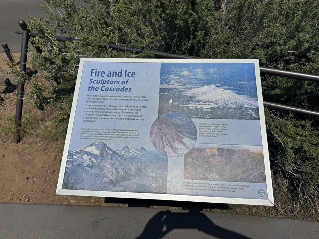 Interpretive sign 'Fire and Ice — Sculptors of the Cascades' explaining how volcanism and glaciers shaped the range