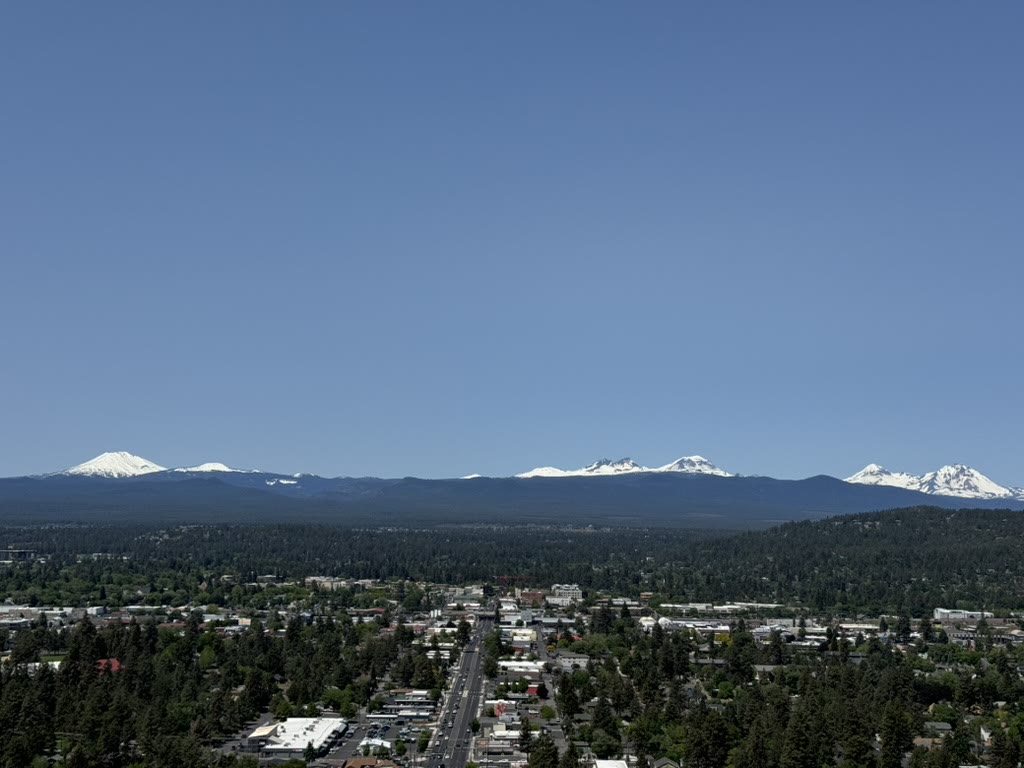 A long view of the Cascades — Three Sisters, Broken Top, and the rest of the chain stretching across the horizon