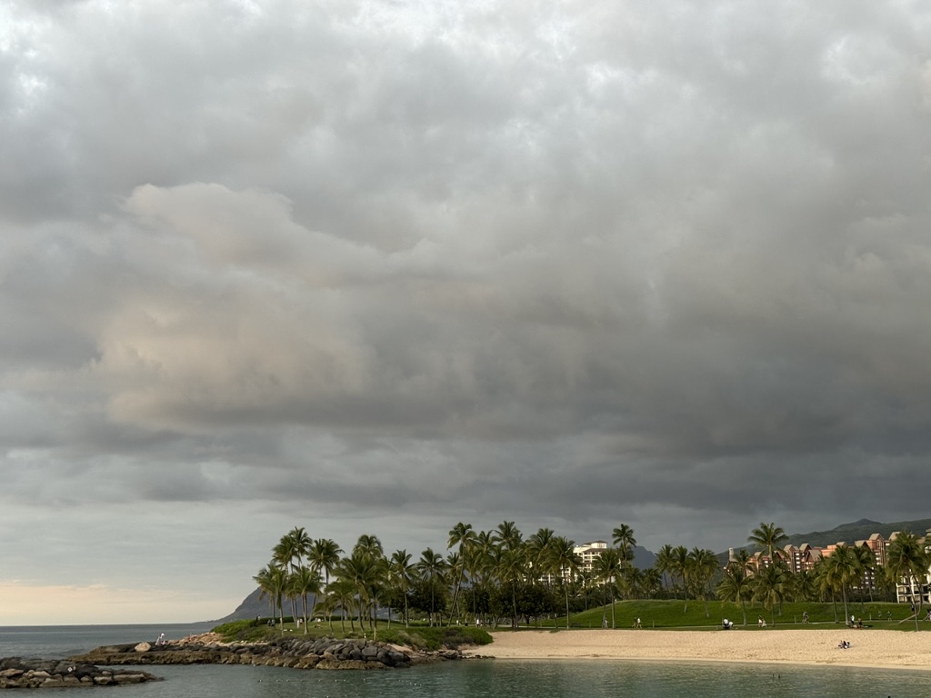 The same lagoon under a heavy overcast — different mood, same place