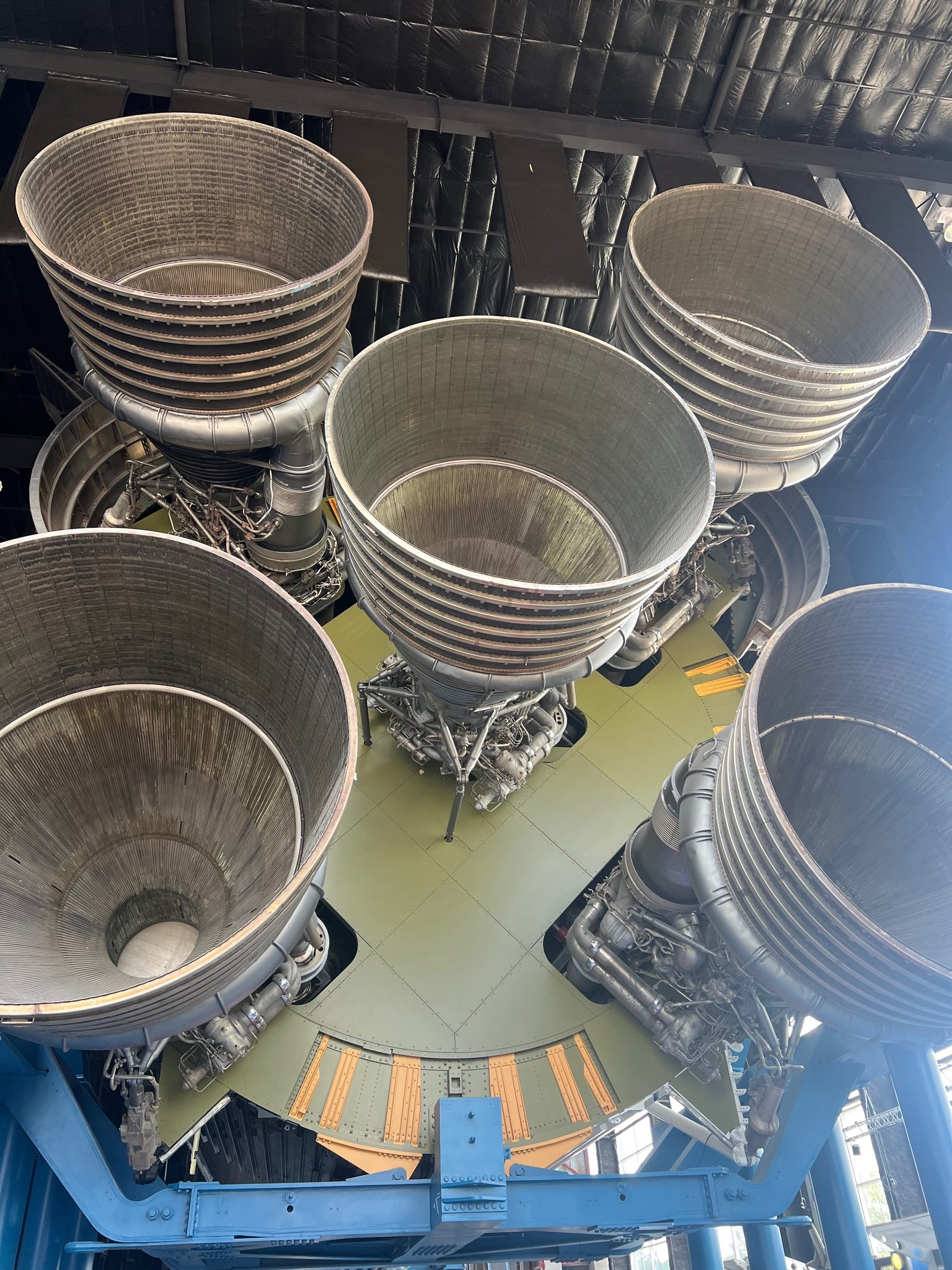 The five F-1 engines clustered at the base of the horizontal Saturn V in the Davidson Center