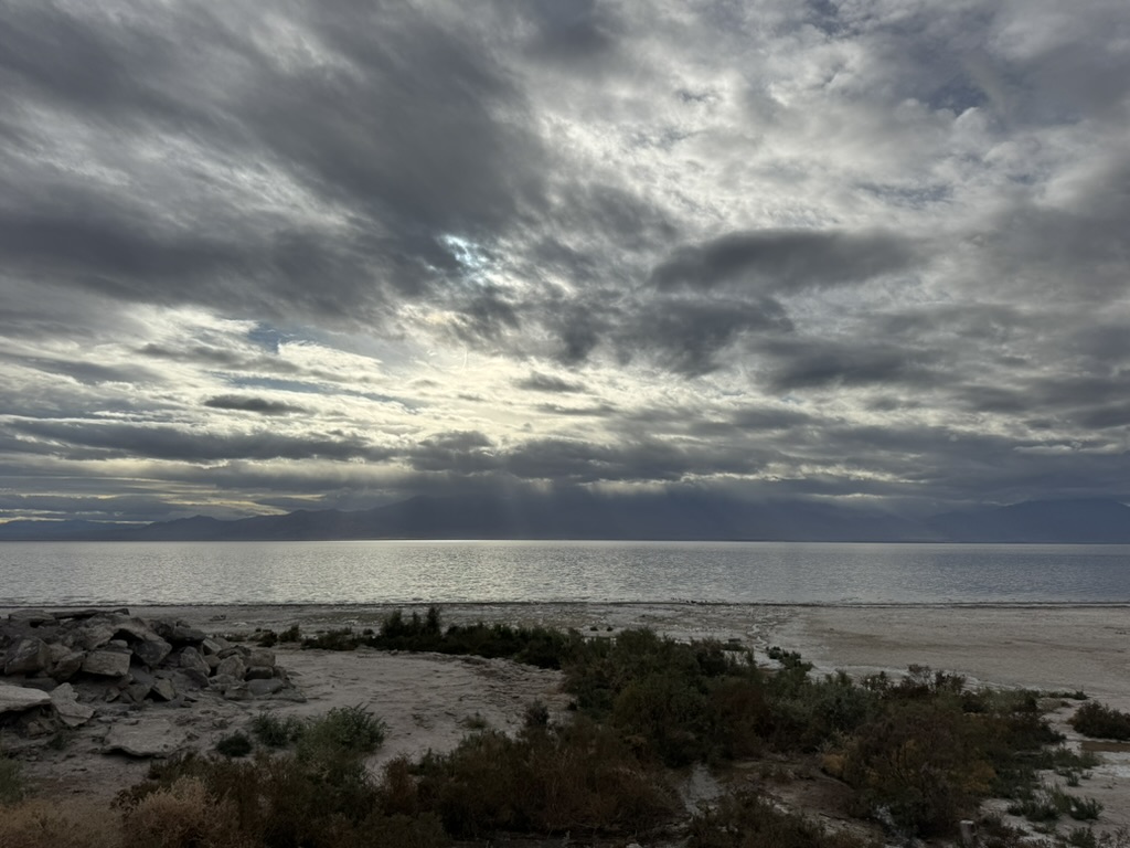 Sun rays breaking through cloud cover over the Salton Sea