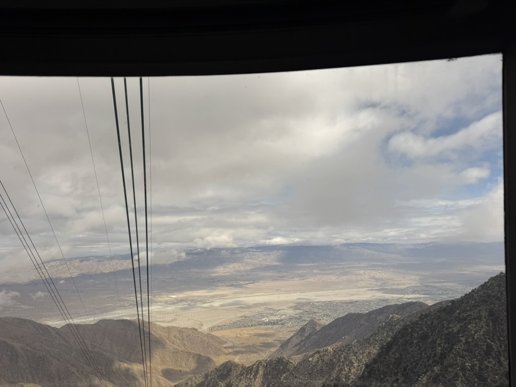 Cables stretching down toward the valley from inside the cabin